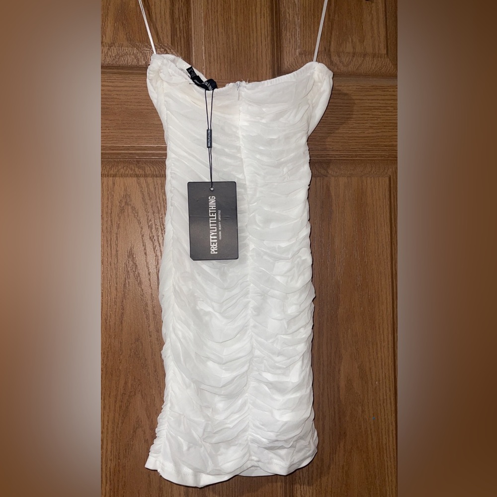 Brand new with tags UK Sz6 fits like a Xs/S